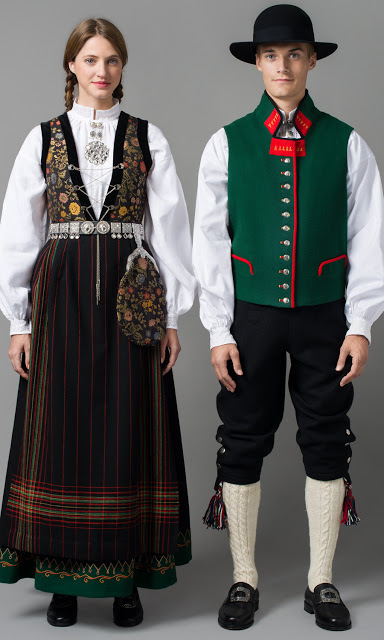 Young man and woman in traditional bunad