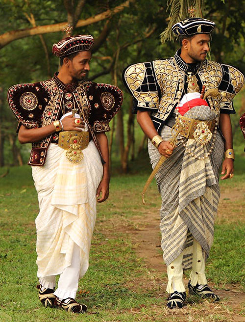 Sri Lankan grooms in traditional embroidered velvet jacket and hat outshine their brides